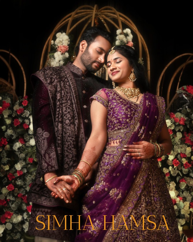 Grand traditional wedding stage decor and couple photography